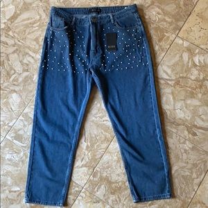 Blue cotton jeans with pearl embellishments